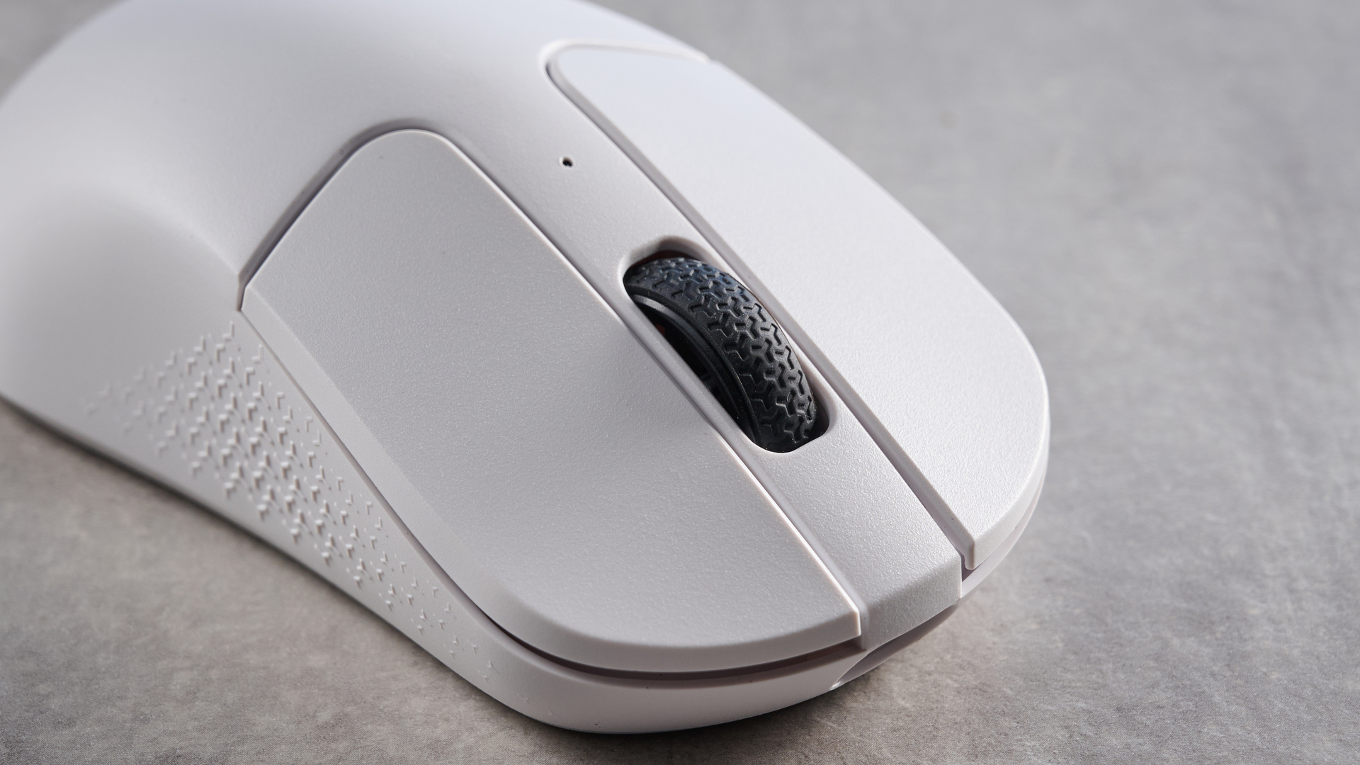 A white Keychron M3 Mini 8K gaming mouse