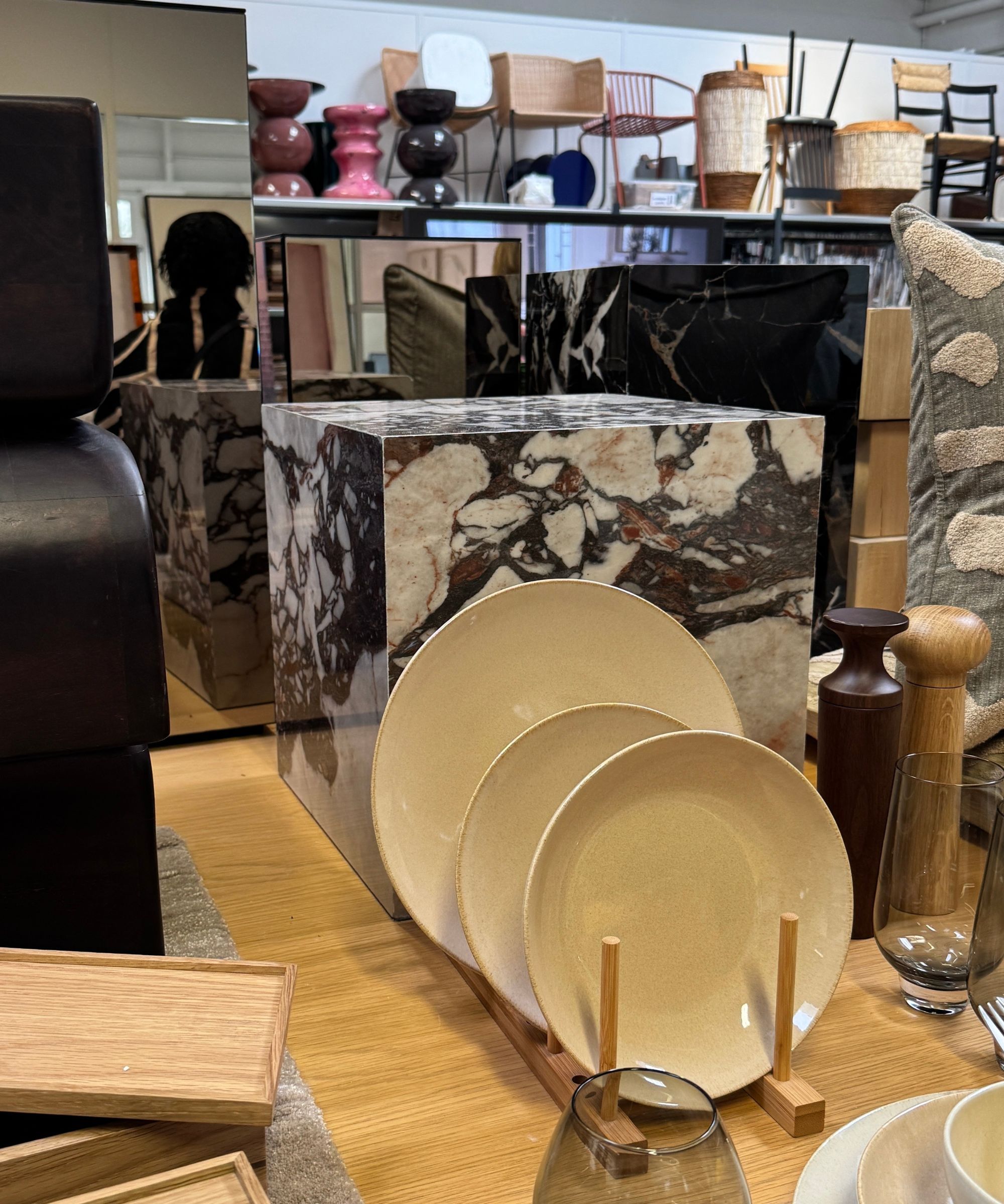 AM.PM homewares including plates, salt and pepper shakers, stone plinth and mirrored plinths