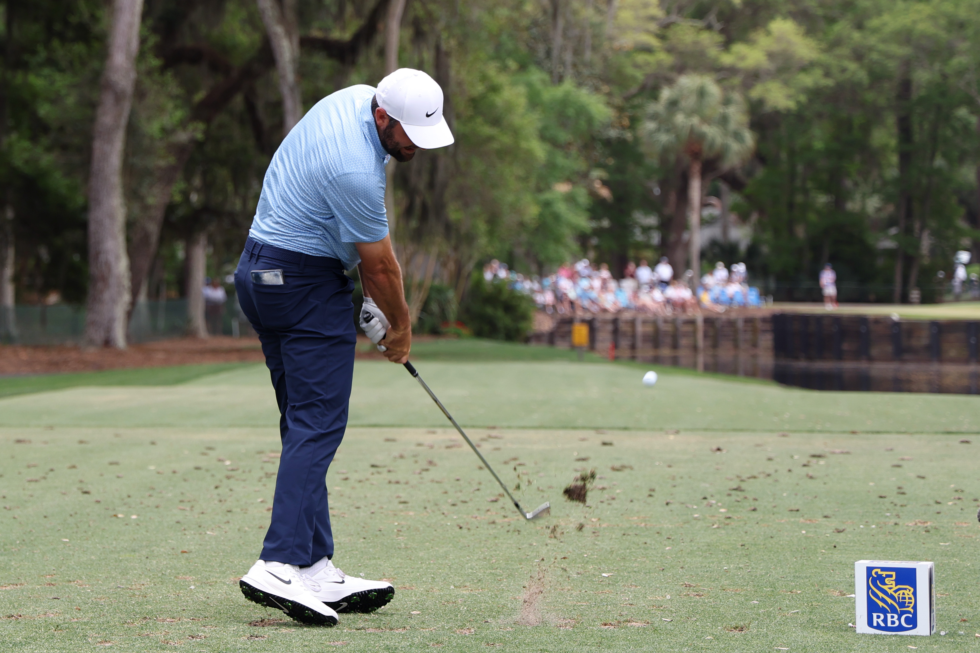 Scottie Scheffler plays his shot from the fourth tee during the final round of the RBC Heritage
