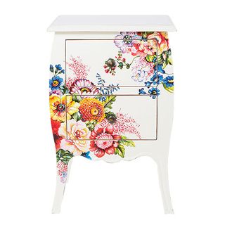 bedside table with floral and white
