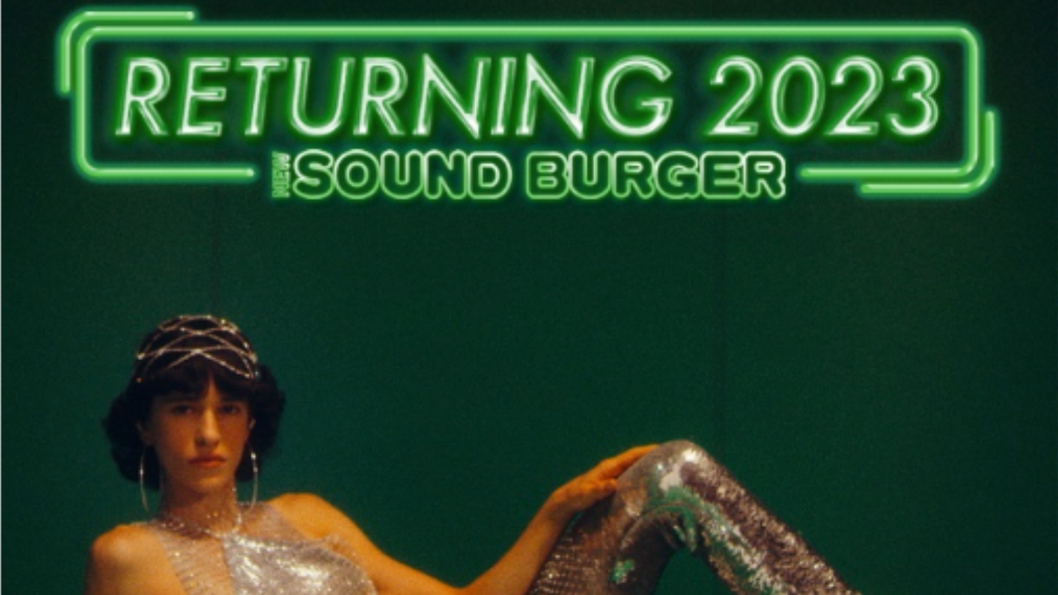 Audio-Technica Sound Burger written in neon green, with a model posing underneath