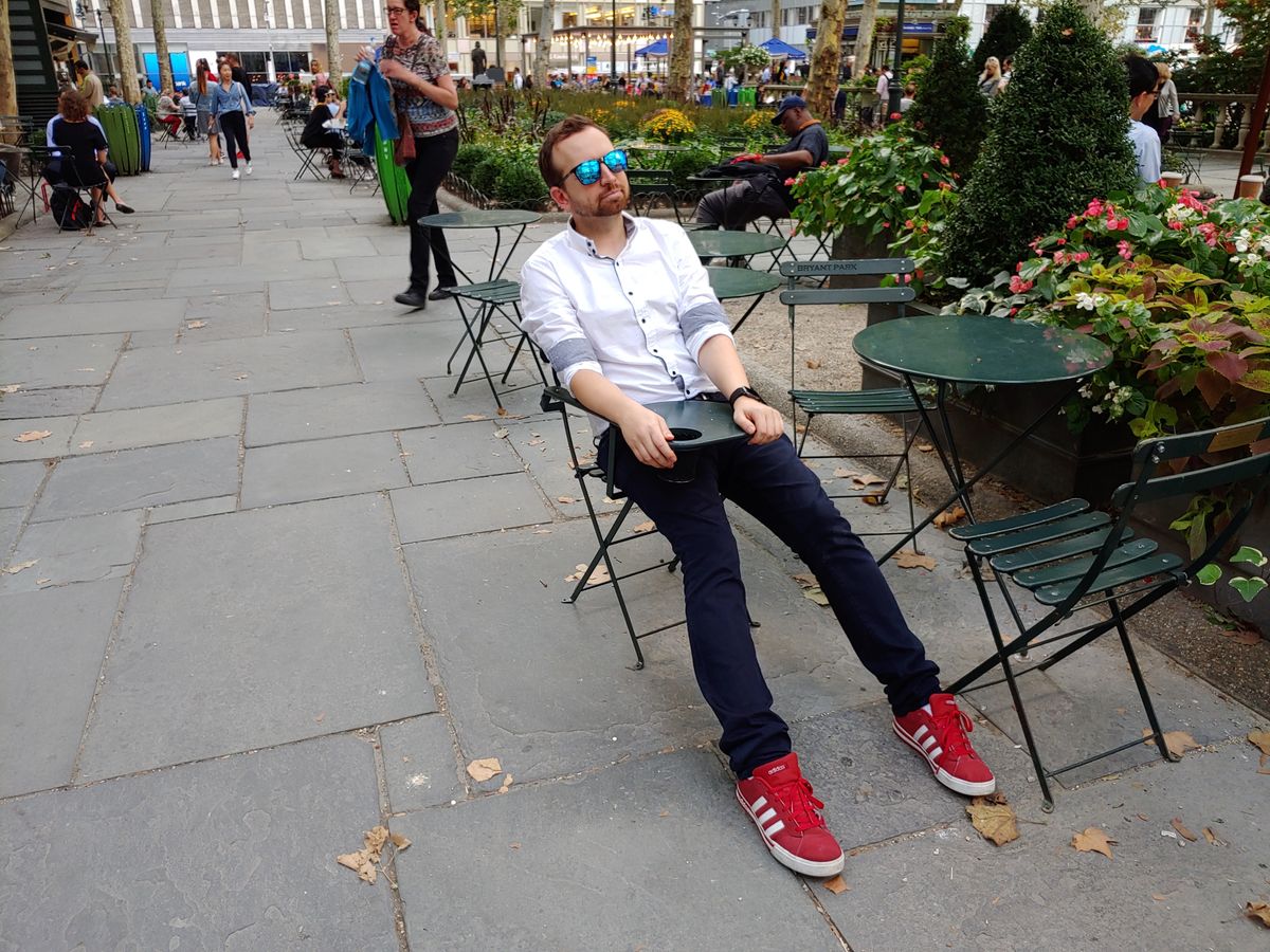 (1/2) Here's a good example in which the LG V40 is inconsistent. It takes a good shot with enough detail in the white shirt.