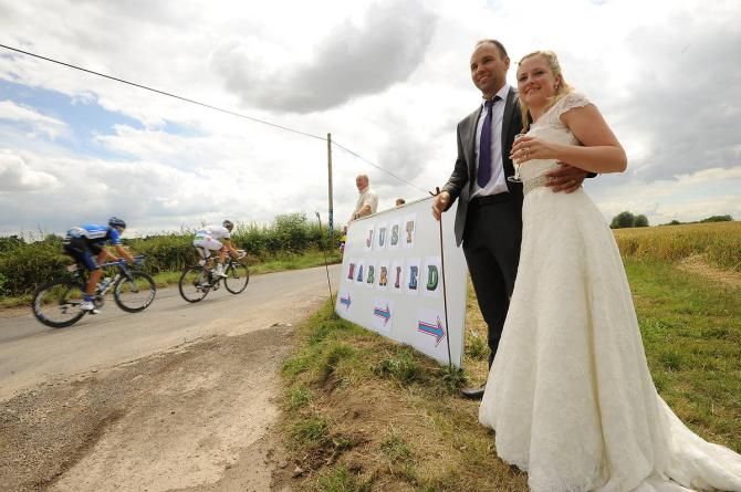 A couple gets into the Tour de France spirit on their wedding day