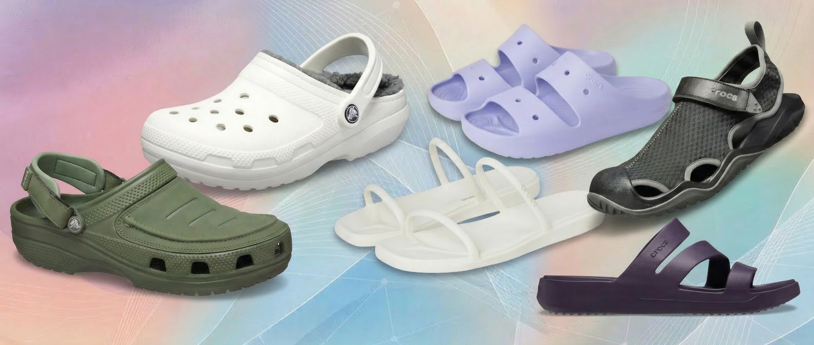 Crocs on display with rainbow gradient background