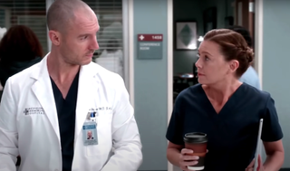 Cormac Hayes and Meredith Grey look at each other.