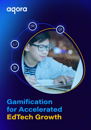 Blue whitepaper cover with photo of young student at a computer with pen and paper