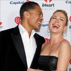 Amy Robach and T.J. Holmes debut their relationship on the iHeartRadio Jingle Ball red carpet.