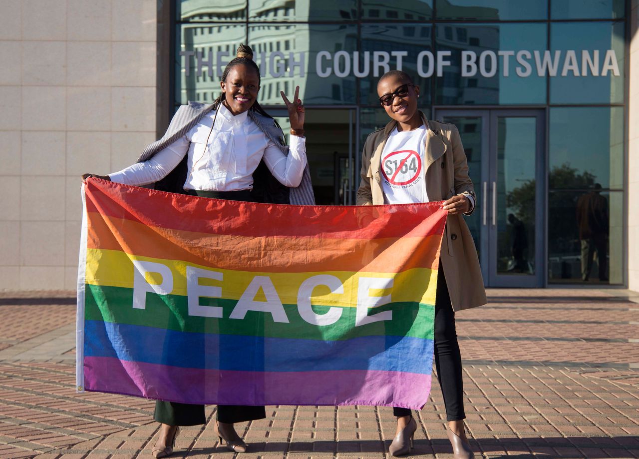 Activists celebrate outside Botswana&amp;#039;s High Court.