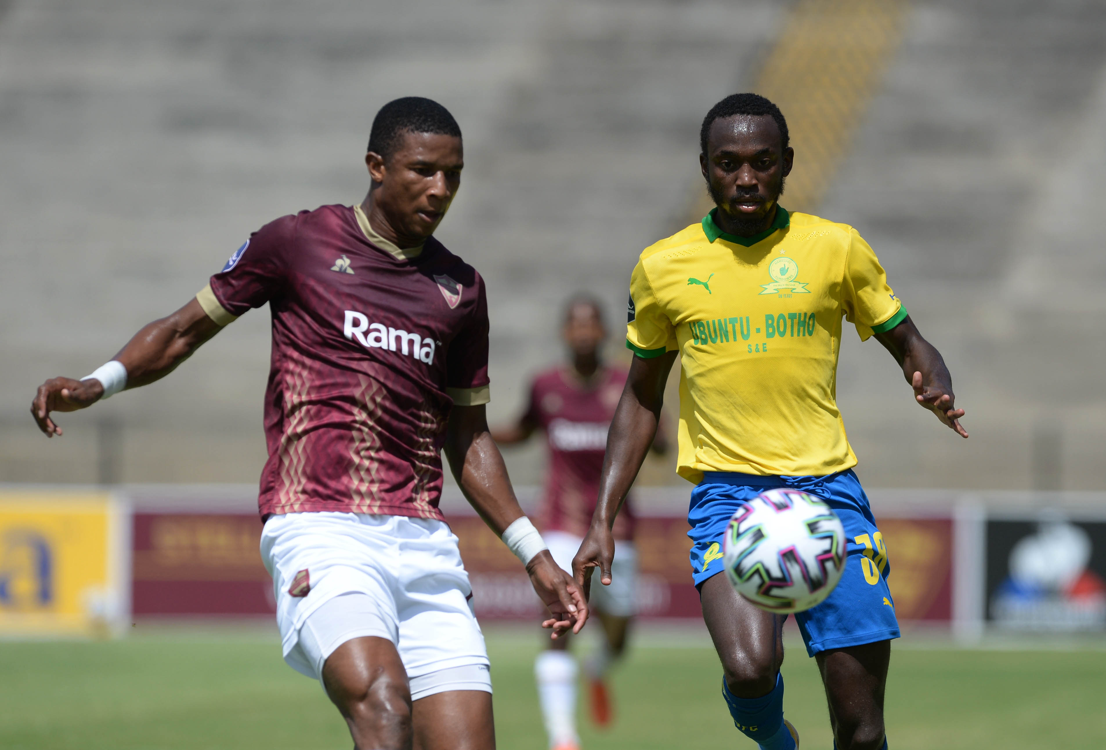 Peter Shalulile of Mamelodi Sundowns is challenged by Sibusiso Mthethwa of Stellenbosch FC