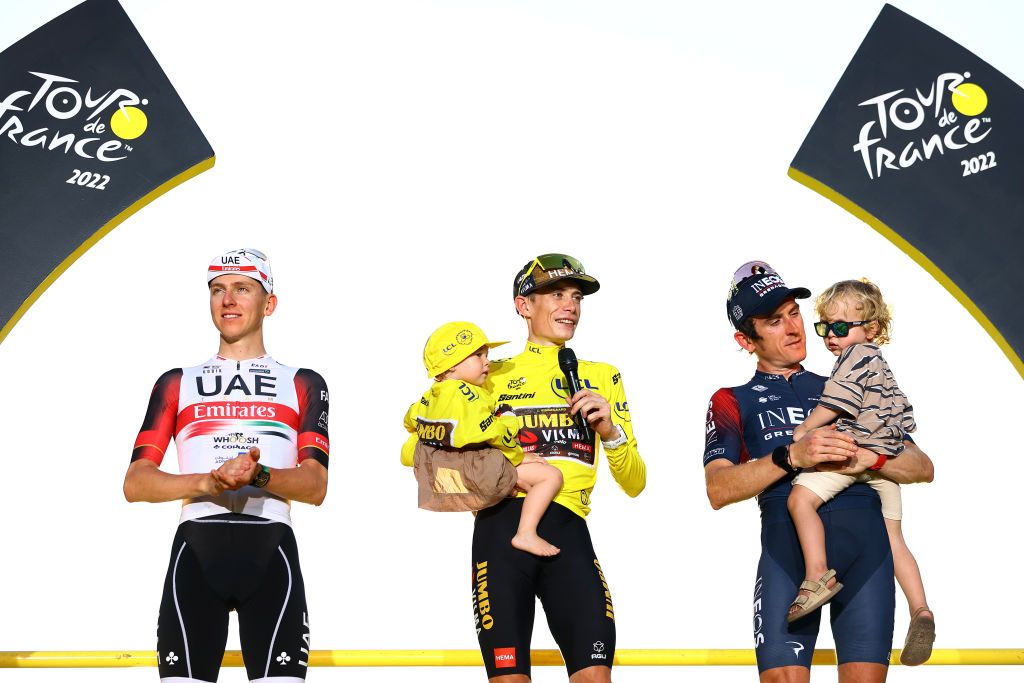 PARIS FRANCE JULY 24 LR Second classified Tadej Pogacar of Slovenia and UAE Team Emirates race winner Jonas Vingegaard Rasmussen of Denmark and Team Jumbo Visma with his daughter Frida and third classified Geraint Thomas of The United Kingdom and Team INEOS Grenadiers with his son pose on the podium during the medal ceremony after the 109th Tour de France 2022 Stage 21 a 1156km stage from Paris La Dfense to Paris Champslyses TDF2022 WorldTour on July 24 2022 in Paris France Photo by Michael SteeleGetty Images