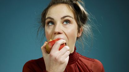 Healthy eating an apple