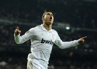 Cristiano Ronaldo celebrates after scoring for Real Madrid against Barcelona in the Copa del Rey in January 2011.