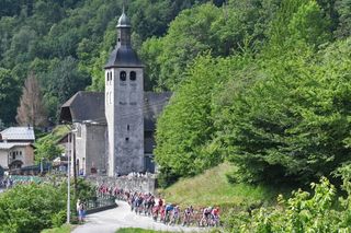 The pack rides during the eighth stage of the 73rd edition of the Criterium du Dauphine cycling race a 147km between La LechereLesBains and Les Gets on June 6 2021 Photo by Alain JOCARD AFP Photo by ALAIN JOCARDAFP via Getty Images