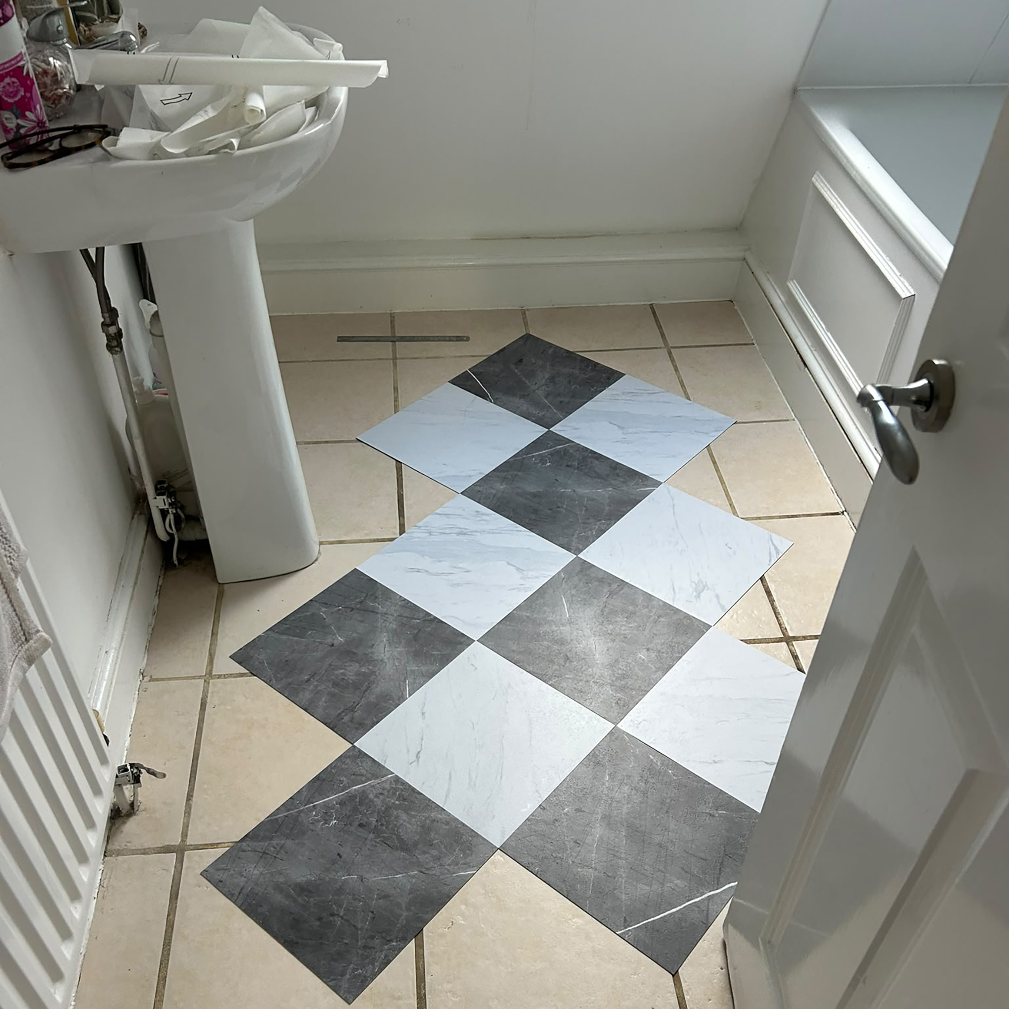 Black and white flooring in bathroom