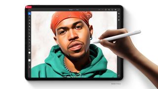 Apple Pencil and iPad with an image of a man on it