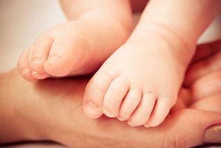 A close up of a baby's toes