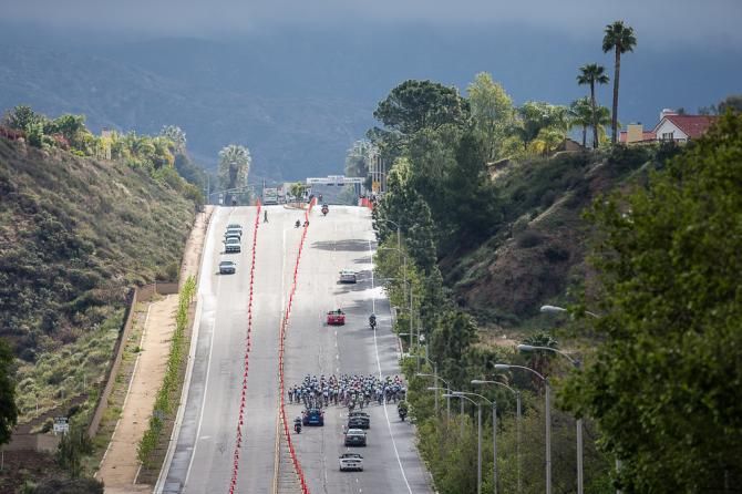 Riders up the climb on lap three