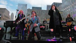 Heart and Jimmy Fallon perform on the rooftop of Rockerfeller Plaza in New York 