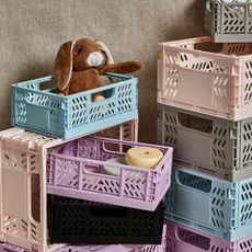 collapsible crate and teddy bear