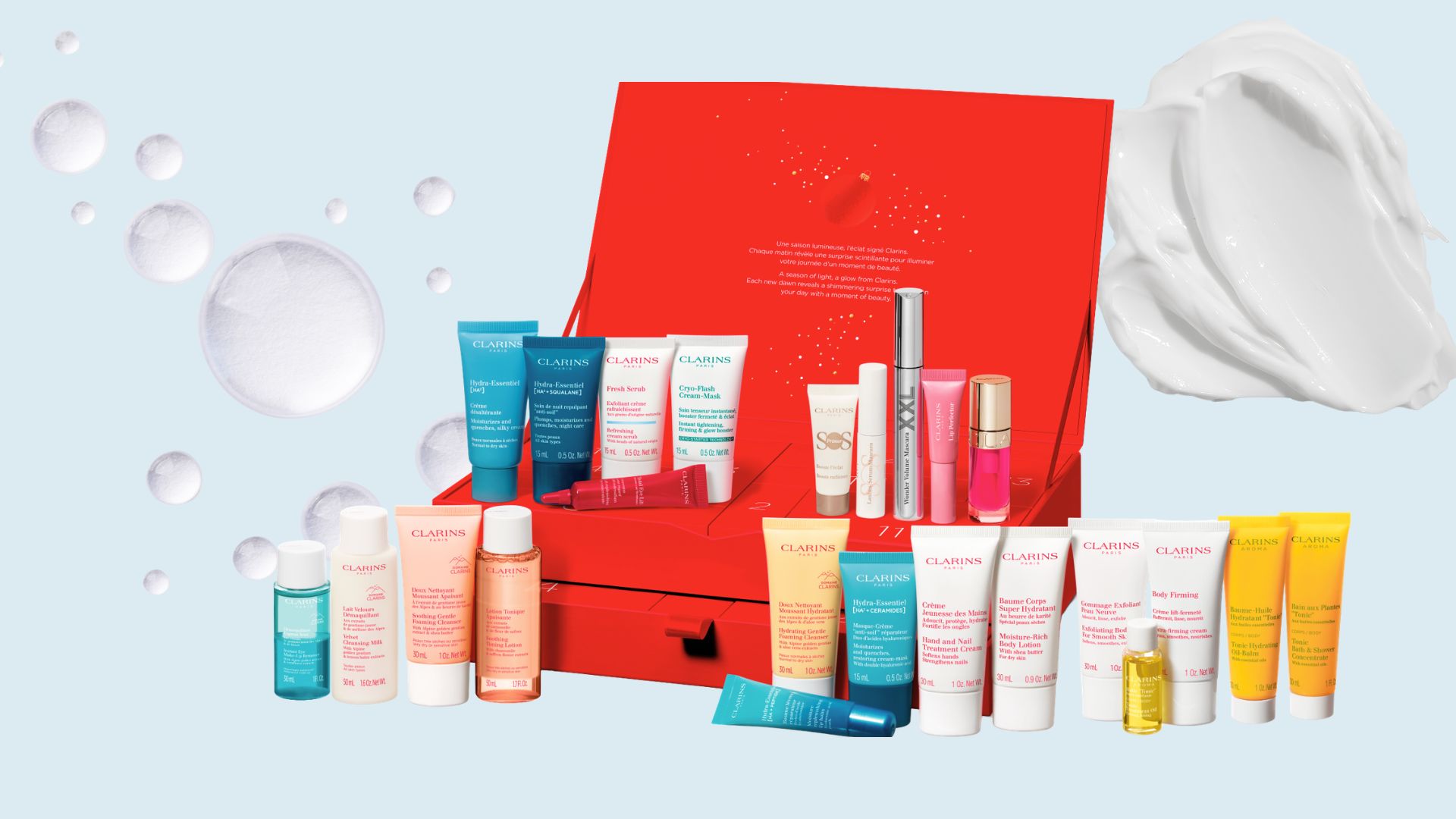 An open Clarins 12-Day Beauty Advent Calendar revealing various skincare and makeup products inside its numbered boxes.