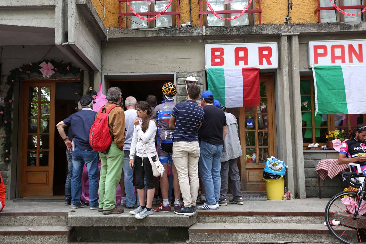 Fans pack into a bar to watch the stage