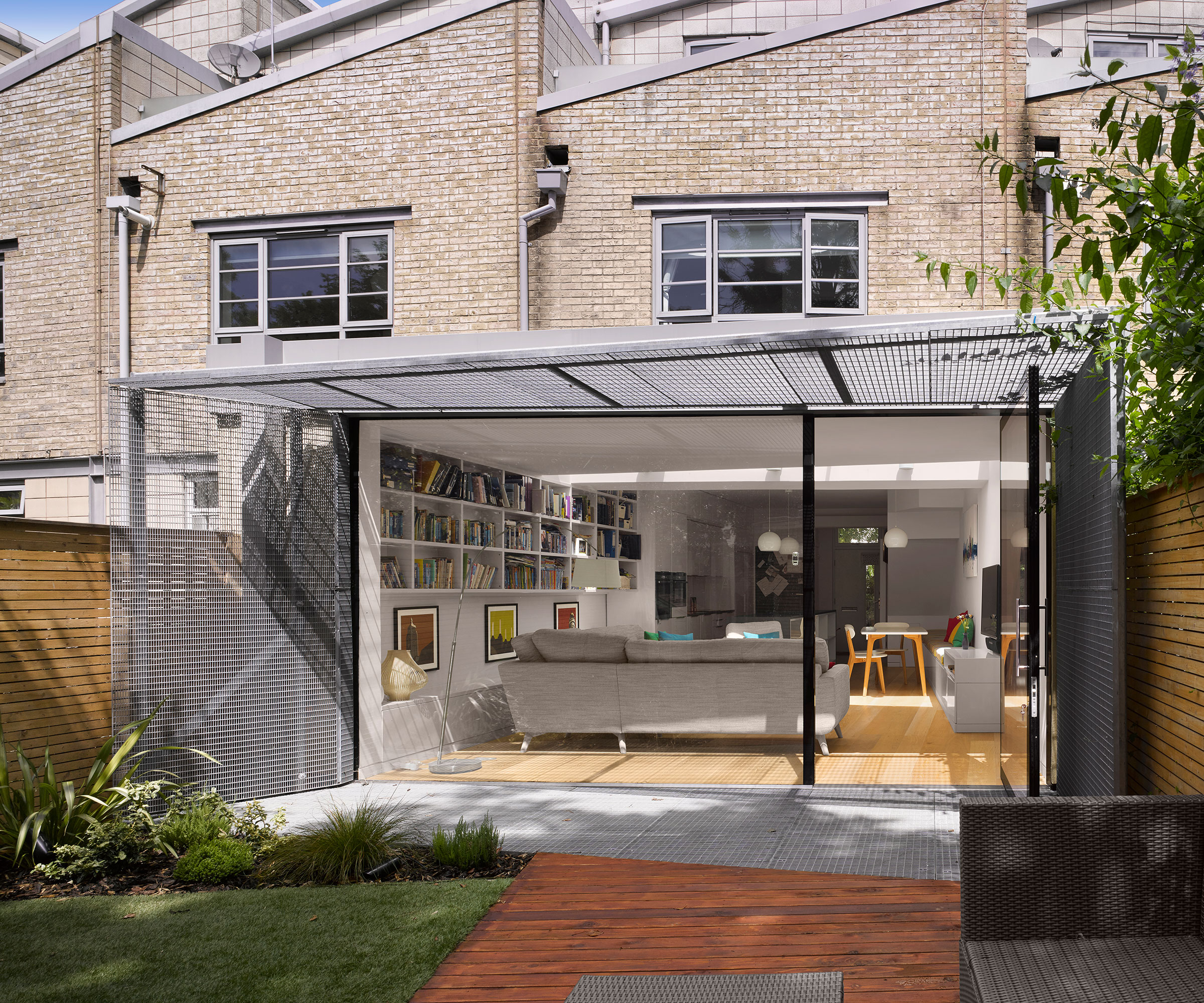 single storey extension with bifold doors and metal grid solar shading