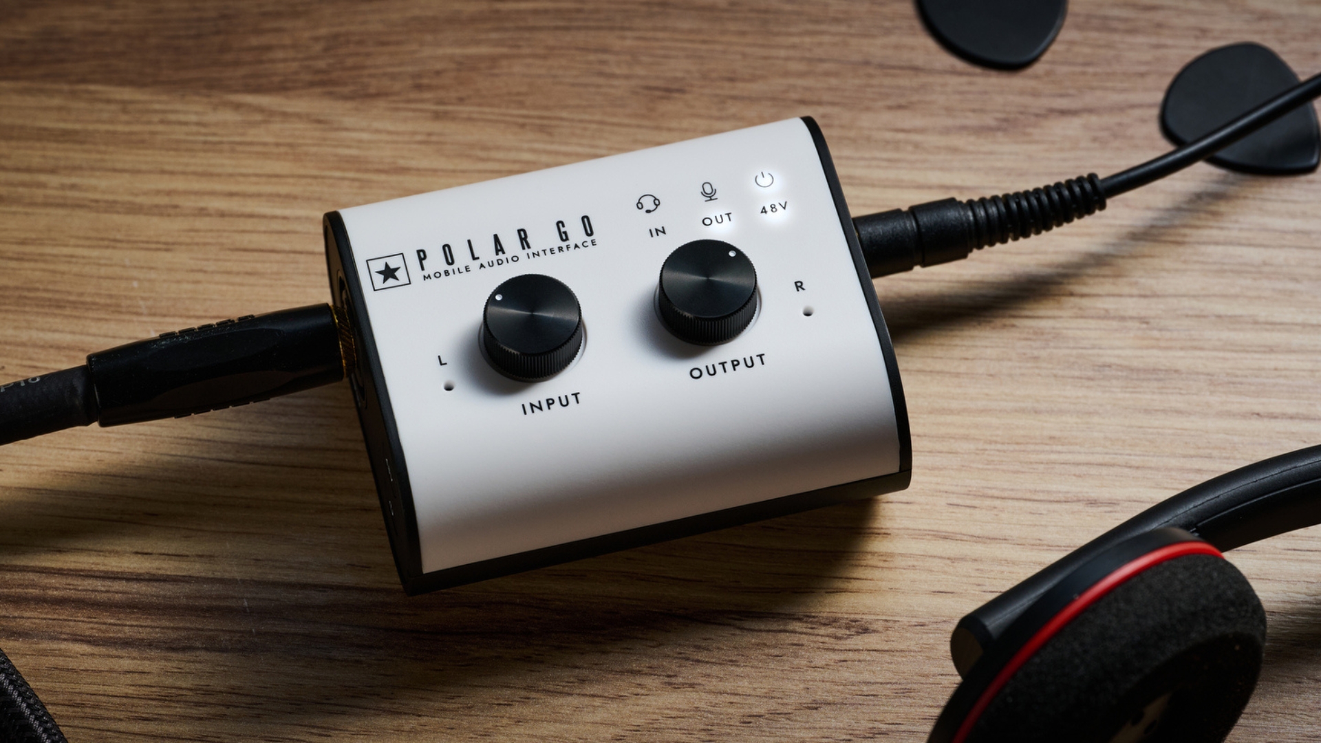 A Blackstar Polar Go audio interface on a wooden desk