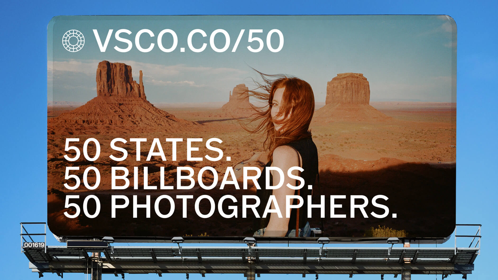 Billboard featuring information about a photography competition.