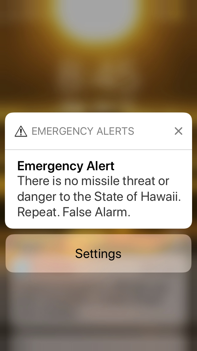 This smartphone screen capture shows the retraction of a false incoming ballistic missile emergency alert sent from the Hawaii Emergency Management Agency system on Saturday, Jan. 13, 2018.
