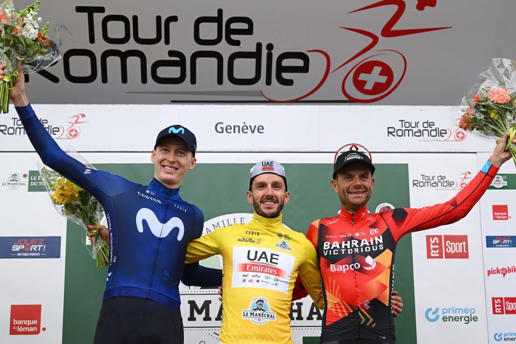 GENVE SWITZERLAND APRIL 30 EDITORS NOTE Alternate crop LR Matteo Jorgenson of The United States and Movistar Team on second place race winner Adam Yates of United Kingdom and UAE Team Emirates Yellow Leader Jersey and Damiano Caruso of Italy and Team Bahrain Victorious on third place pose on the podium ceremony after the 76th Tour De Romandie 2023 Stage 5 a 1708km stage from VufflenslaVille to Genve UCIWT on April 30 2023 in Genve Switzerland Photo by Dario BelingheriGetty Images