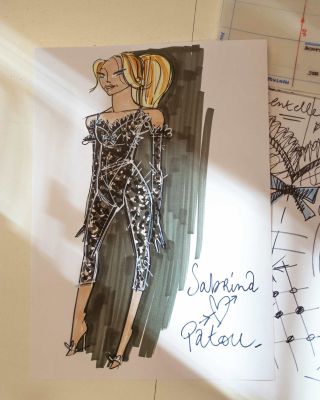 a sketch of Sabrina Carpenter's custom Patou jumpsuit from the Short N Sweet tour