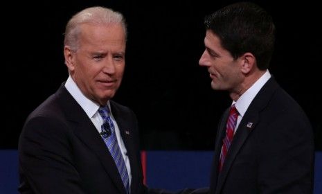 Vice President Joe Biden and Republican vice presidential candidate Rep. Paul Ryan (R-Wis.) shake hands after their debate: Though most people believe Biden dominated the conversation, there 