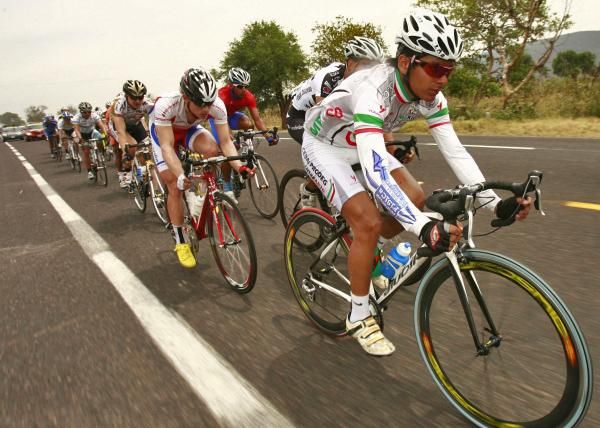 Ivan Carbajal rides on the front.