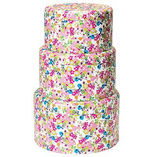 cake tins with floral and white background