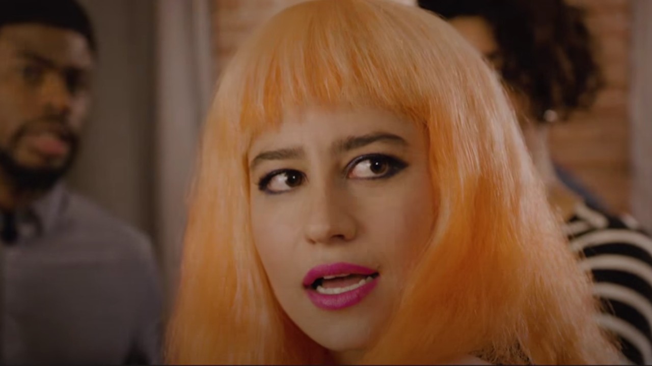 Ilana in an orange wig on Broad City