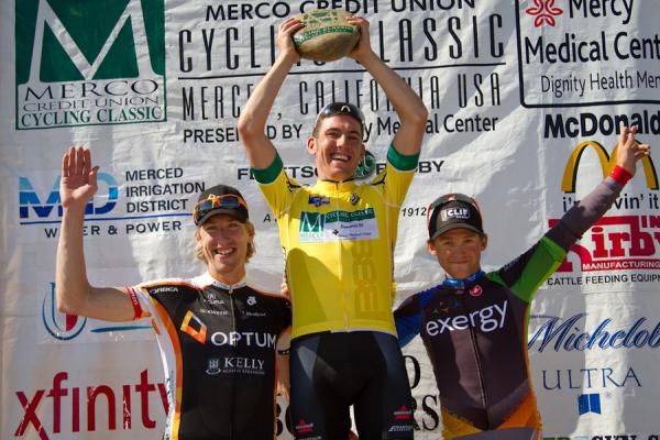 Merco Cycling Classic overall champion Patrick Bevin (Bissell) hoists his trophy rock, surrounded by Tom Zirbel (Optum) and Logan Loader (Exergy) in second and third.