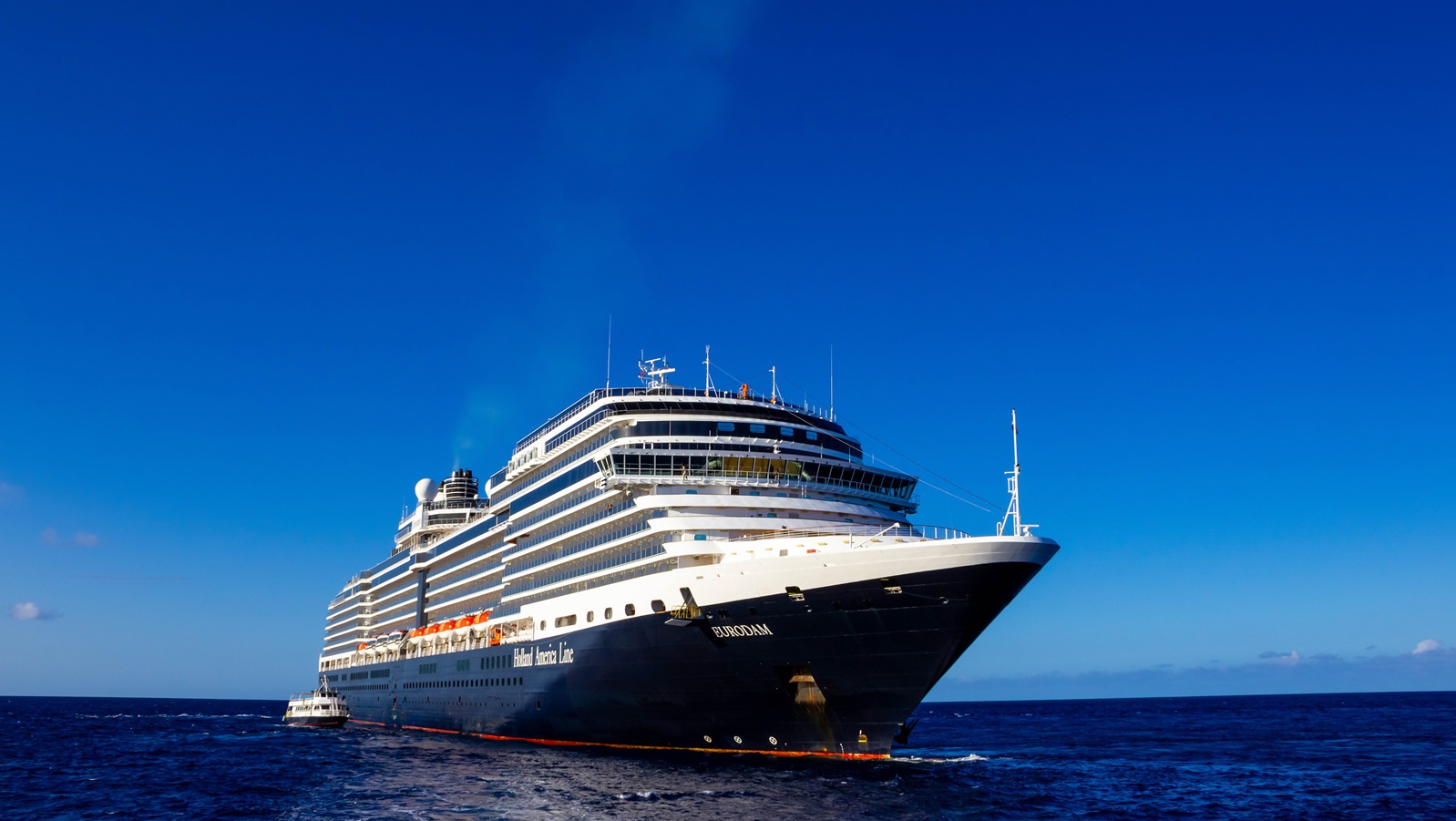 Half Moon Cay island, Bahamas - December 2, 2019: Holland America cruise ship Eurodam docked at sea near Bagamas