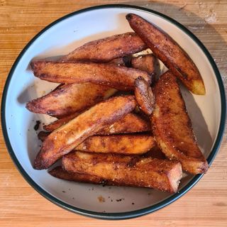the deep fried chips in a bowl, after the Air fryer vs deep fryer experiment