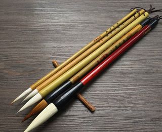 These wood and bamboo brushes come in various sizes