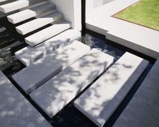 water feature with stepping stone path