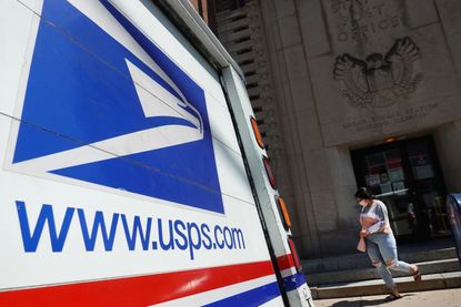 A postal vehicles sits in front of a United State Postal Service facility on August 13, 2020 in Chicago, Illinois.