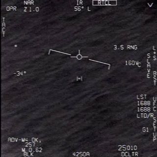 A still from a video taken by a U.S. Navy pilot of an unidentified anomalous phenomenon.