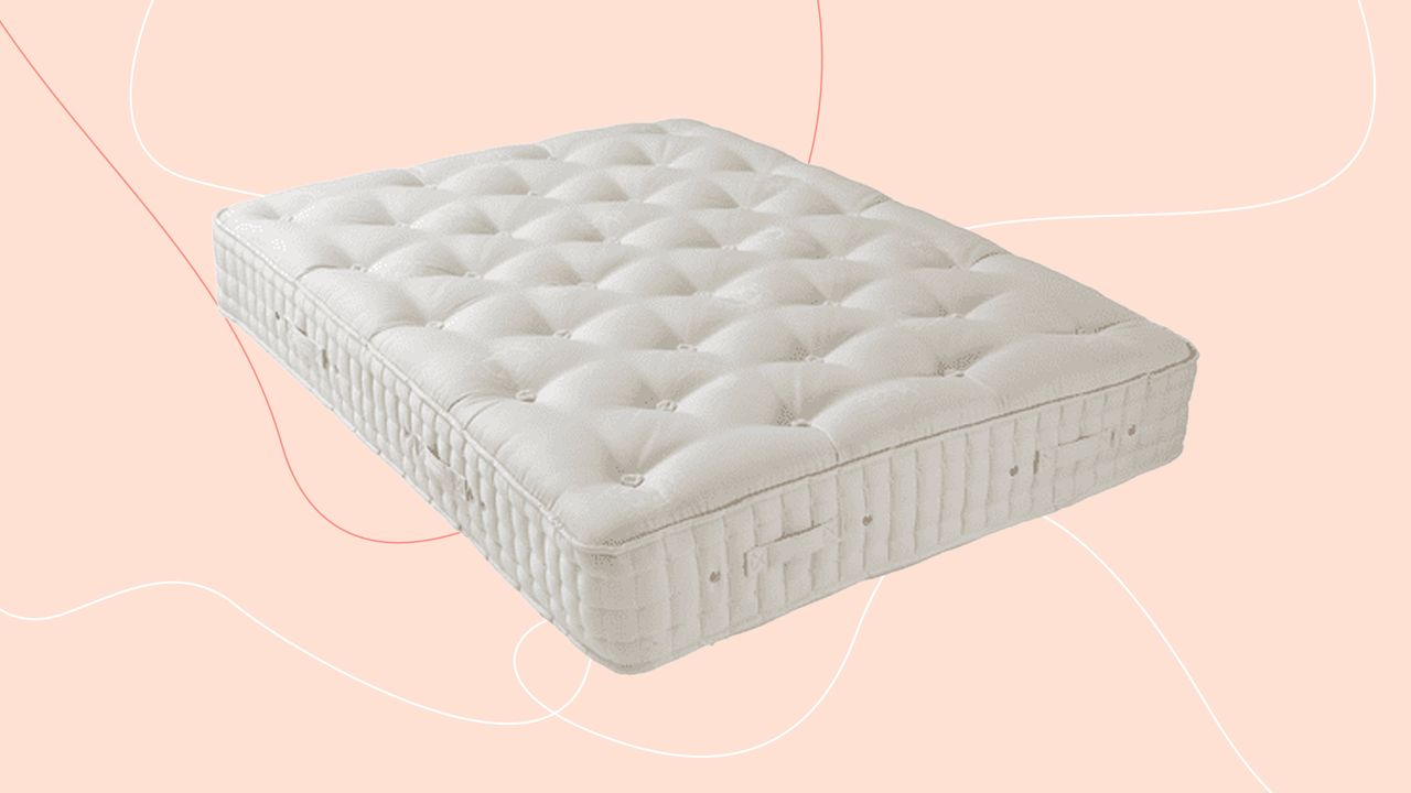 The Hypnos Wool Origins 6 mattress on a pink background