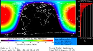 A map showing where the sunlit portion of the Earth was at the time of the eruption and the high frequency radio blackouts indicated by red patches. All of the high frequency blackouts are located across the Pacific regions.