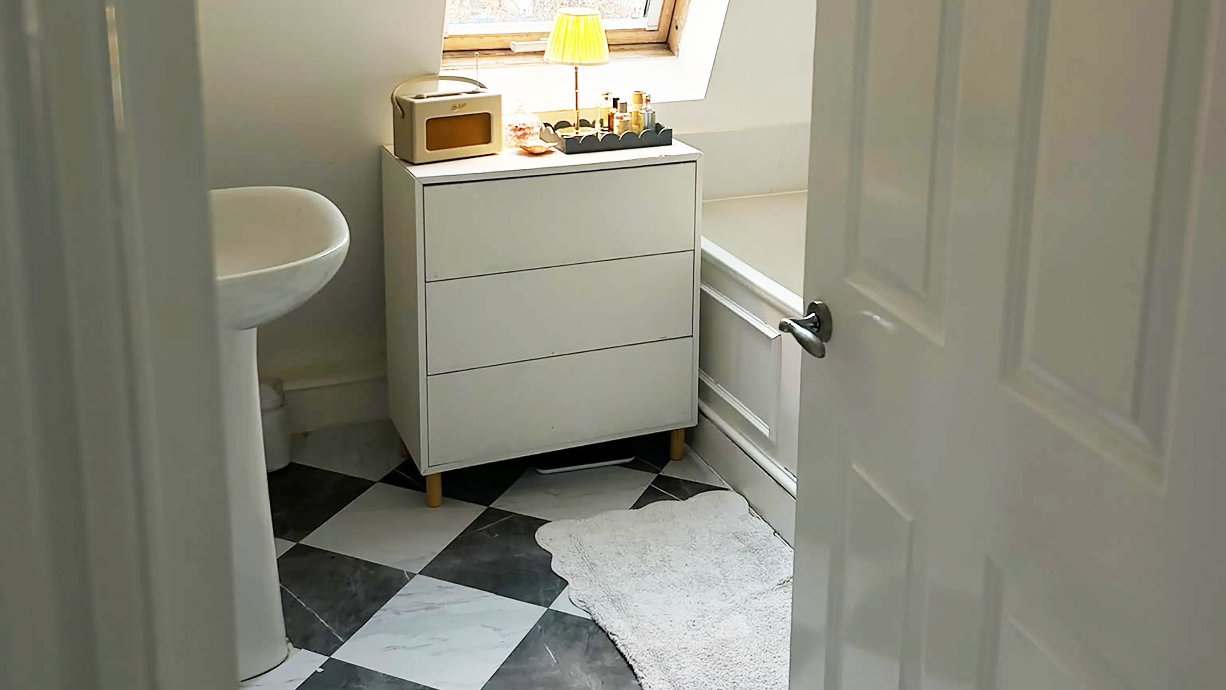 These Dunelm adhesive floor tiles have completely transformed my bathroom for less than £90 - here's what I learned from my weekend DIY project