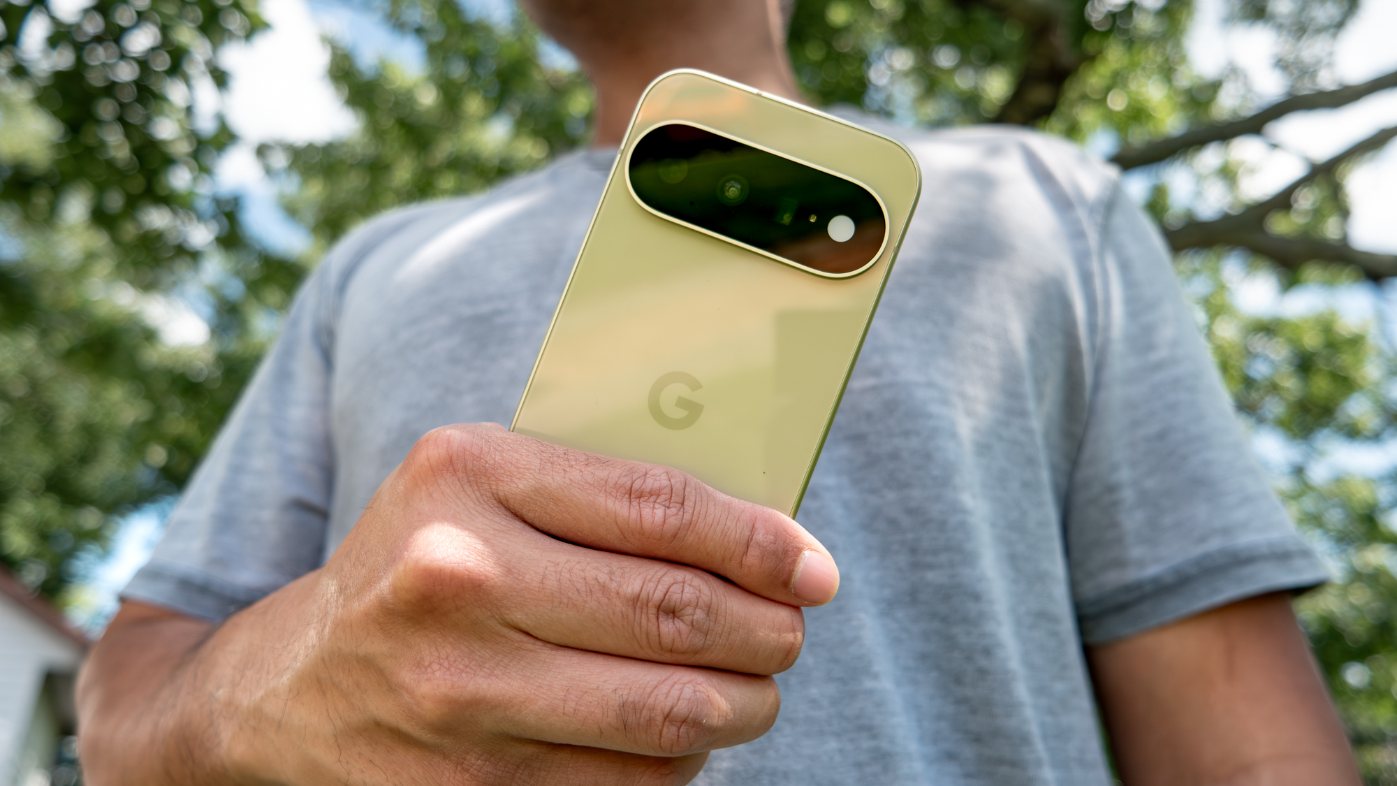 Google Pixel 11 held in the hand.