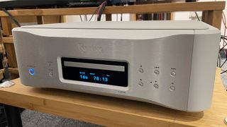 Esoteric K-05XD CD player from front slight angle on hi-fi rack