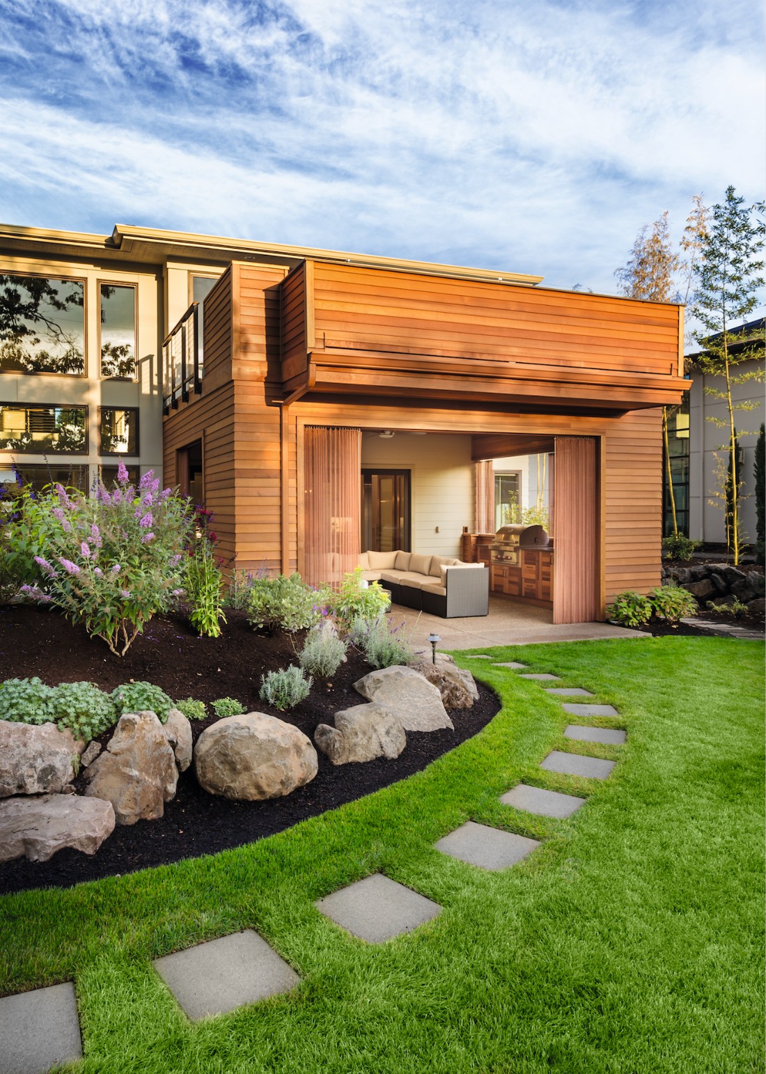 Modern garden with wooden balcony