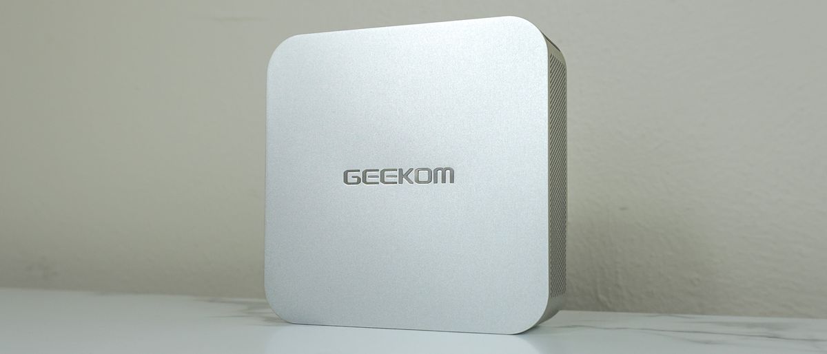 The Geekom A6 upright on a desk