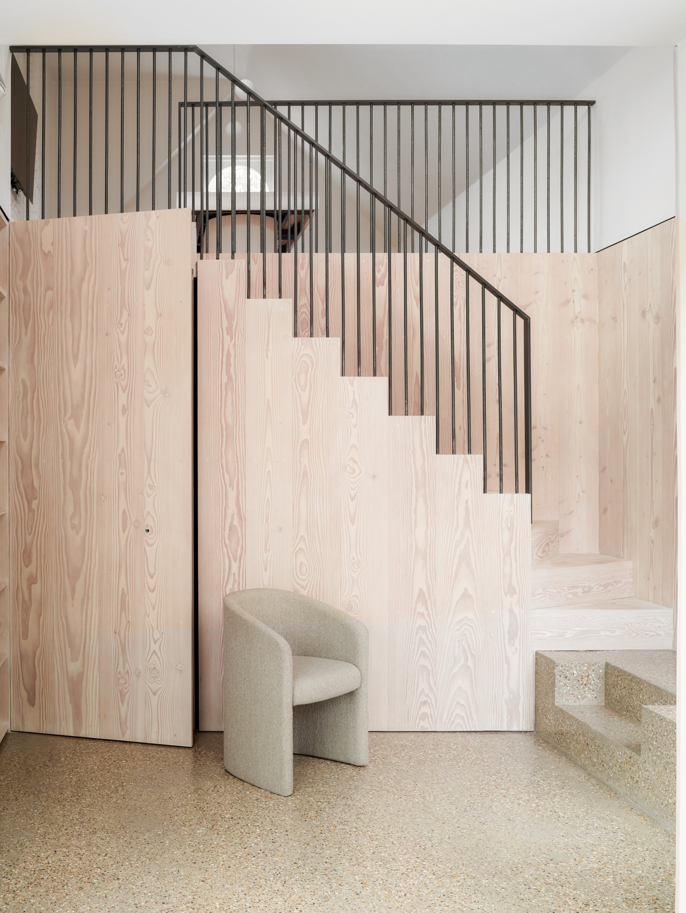 Wood staircase with metal railings